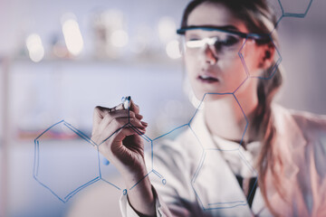 Poster - Portrait of a confident female health care expert in life science laboratory writing structural chemical formula on a glass board. Healthcare and modern life science concept. Blue toned image.