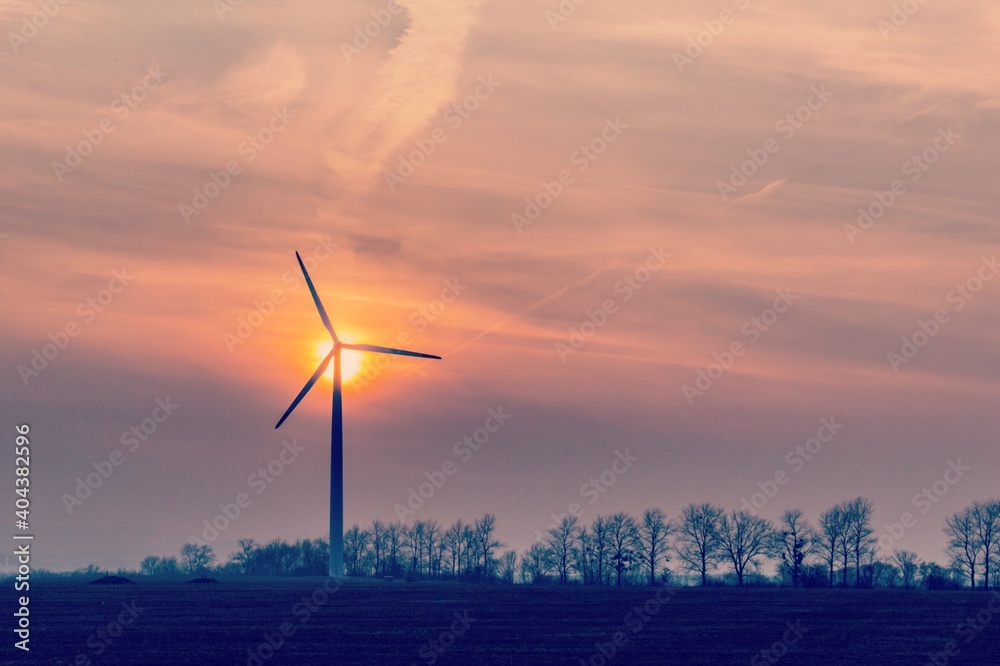 Silhouette Windmill On Field Against Sky During Sunset - obrazy, fototapety, plakaty 