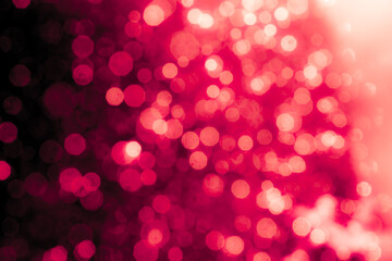 Wall Mural - Red light glowing defocused holiday blurr bokeh in black