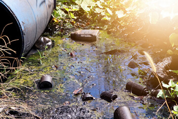 Wall Mural - Dumped old fuel tanks and car