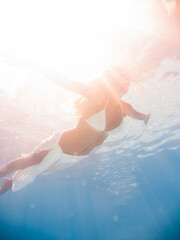 Poster - Woman underwater at the pool