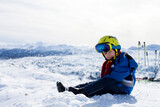 Fototapeta Panele - Cute little boy, skiing happily in Austrian ski resort in the mountains
