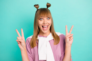 Canvas Print - Photo of young excited girl happy positive smile show peace cool v-sign tight jumper isolated over turquoise color background