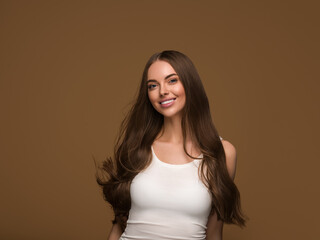 Wall Mural - healthy teeth smile beautiful long hair woman clean skin happy female portrait