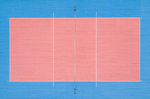 Volleyball Court Top View. Pink And Blue Wooden Floor In Gym.
