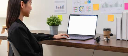 Aufkleber - Business women hand using laptop and type on the keyboard. Mockup screen of advertisement.