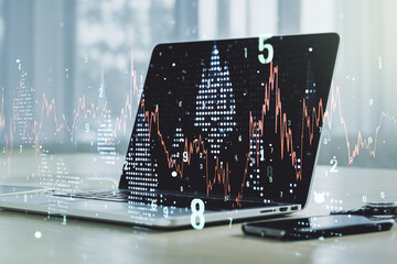 Abstract creative financial graph on modern laptop background, financial and trading concept. Multiexposure