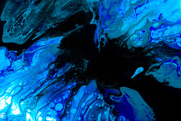 Abstract painting drawn by fluid acrylic technique. Picture with blue, green, emerald, colorful water stains, gradients on dark background. Imitation of northern lights on canvas. Modern art concept.