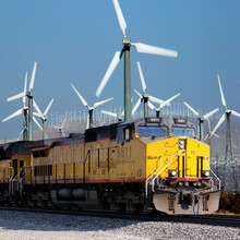 Locomotive Passing Wind Turbines - California - USA