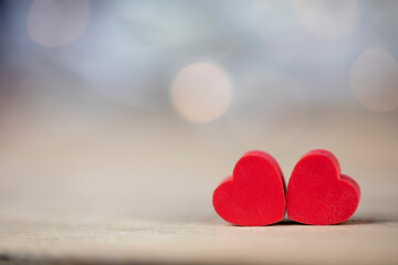 Valentines day background with two red hearts	
