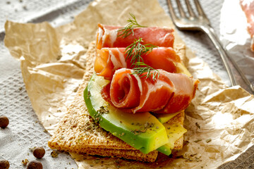 Poster - Fresh Serrano ham on the table in the light of the morning sun