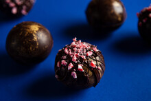 Hot Chocolate Bombs On Blue Background