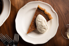 Slice Of Salted Caramel Pie With Whipped Cream