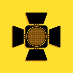 Poster - Black Movie spotlight icon isolated on yellow background. Light Effect. Scene, Studio, Show. Long shadow style. Vector.