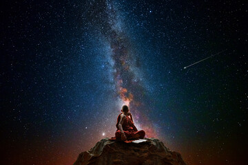 Wall Mural - Buddhist monk looking at the universe