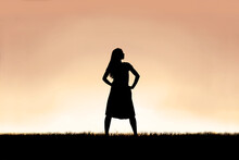 Strong Beautiful Woman Silhouette Isolated Against Sunset Sky Background