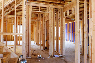 Wall Mural - Framing beam of new house under construction home framing