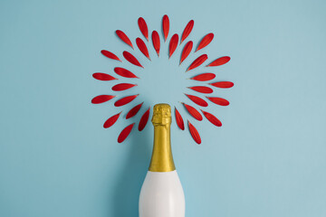 Wall Mural - A flower made of red gerbera petals and a bottle of champagne. Love concept. Flat lay.