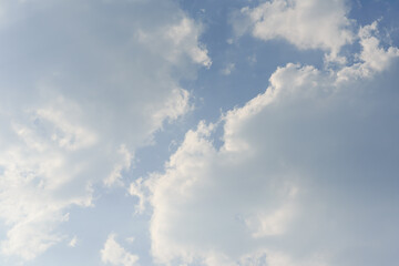 Wall Mural - Blue sky with white clouds and sunlight in the day