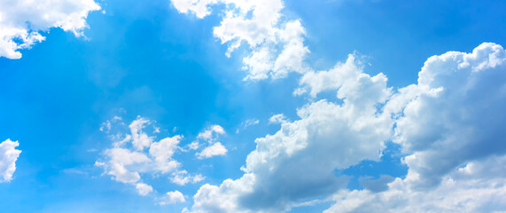 Wall Mural - sky and clouds background,bright day light in blue sky with white fluffy clouds