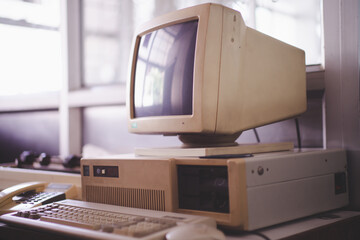 Old office and computer with obsolete technology