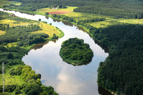 Obraz Dibond Scenic View Of Green Landscape And Lake Against Sky