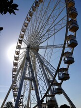 Low Angle View Of Ferris Wheel Against Sky