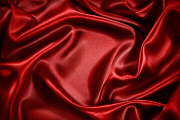 Wall Mural - Red silk satin background. Shiny fabric with wavy soft pleats. Beautiful fabric background with empty space for your product and design.