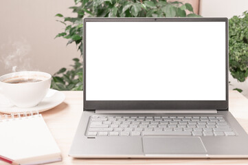 Poster - mockup laptop, notebook on wooden desk at home office workspace. Notebook with blank screen on table In home Office Space