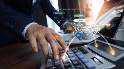 Poster - Businessman using laptop analyzing sales data and economic growth graph chart on global network and using calculator to calculate the numbers currency exchange, Marketing, Banking and financial.