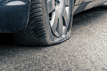 Flat Car Tire Close Up, Punctured Wheel