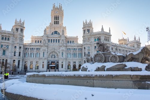 Fototapeta Plaza de la Cibeles in Madrid covered in snow after the storm Filomena passed through the capital. Extreme cold. Nevada in Madrid. Filomena storm.
