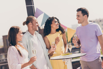 Poster - Photo of young attractive cheerful friends chat talk drink champagne have fun celebrate enjoy party