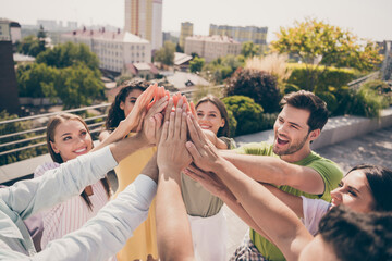 Poster - Top above high angle view photo of young attractive smiling cheerful best friends give high five teamwork on rooftop outdoors