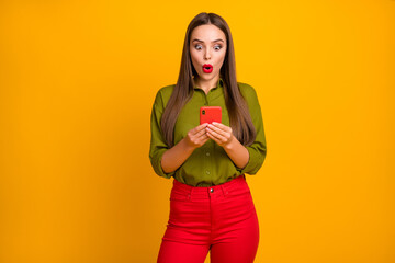 Poster - Portrait of attractive amazed straight-haired girl using device 5g browsing web reading post isolated over bright yellow color background