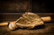 Antique baseball gloves and ball