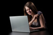 © antoniotruzzi - Young girl with long brown hair to the laptop