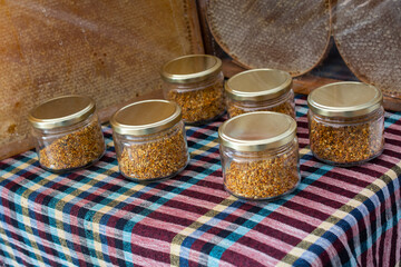 Bee pollen as healthy organic raw food in jars