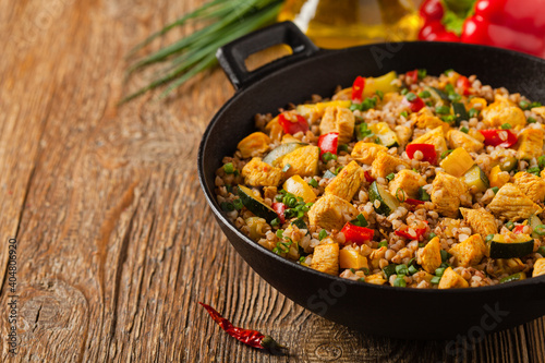 Obraz Dibond Buckwheat with chicken and vegetables.