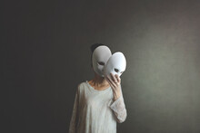 Woman Takes Off The Mask From Her Face But Underneath Her She Has Another Mask, Concept Of Hiding One's Soul And Oneself