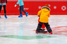 In Winter, On A Frosty Day At The Rink, Children Go Ice Skating.