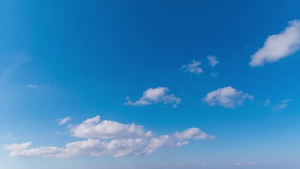 Wall Mural - 4k time lapse of blue sky with close up white fluffy tiny clouds background and pattern
