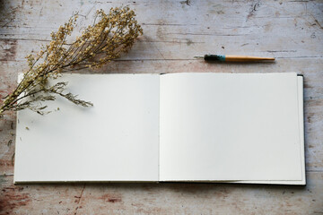 Blank journal open for creative writing or journaling art activities