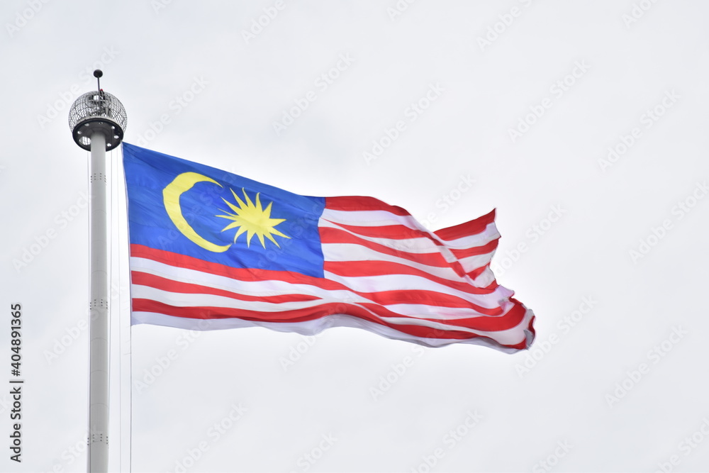Low Angle View Of Malaysian Flag Against Clear Sky - obrazy, fototapety, plakaty 