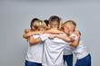 © Roman - teenager boys gathered to talk having rest during soccer game, discussion in circle