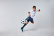 © Roman - boy playing soccer, happy child, young male teenager enjoying sports game, isolated portrait, kids activities, little soccer player