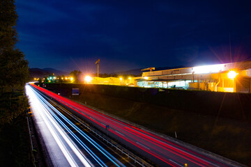 Vehicle car light trails on highway