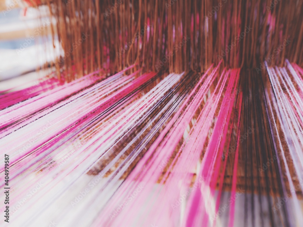 Full Frame Shot Of Pink Threads At Handloom Factory - obrazy, fototapety, plakaty 