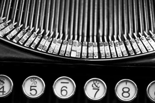 Metal types of portable typewriter, ancient form of mechanical typewriting.