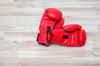 © shine - Boxing gloves on wooden floor and leave space for adding your content. Advertising concept